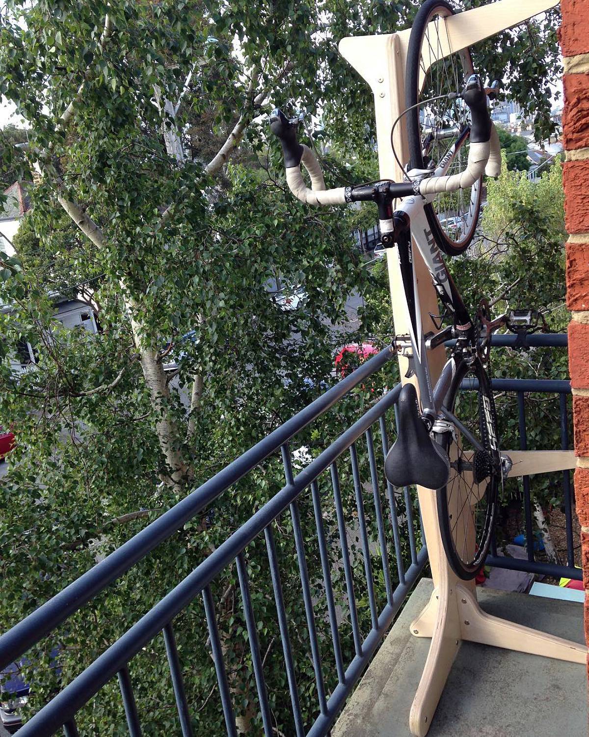 bike stand on a small balcony