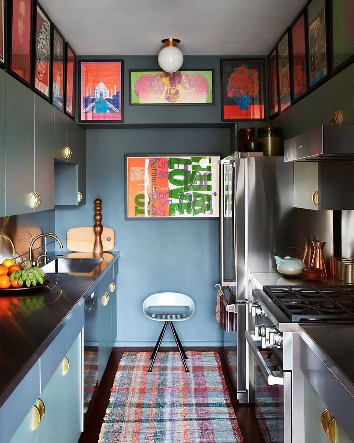 lots of picture frame on blue kitchen