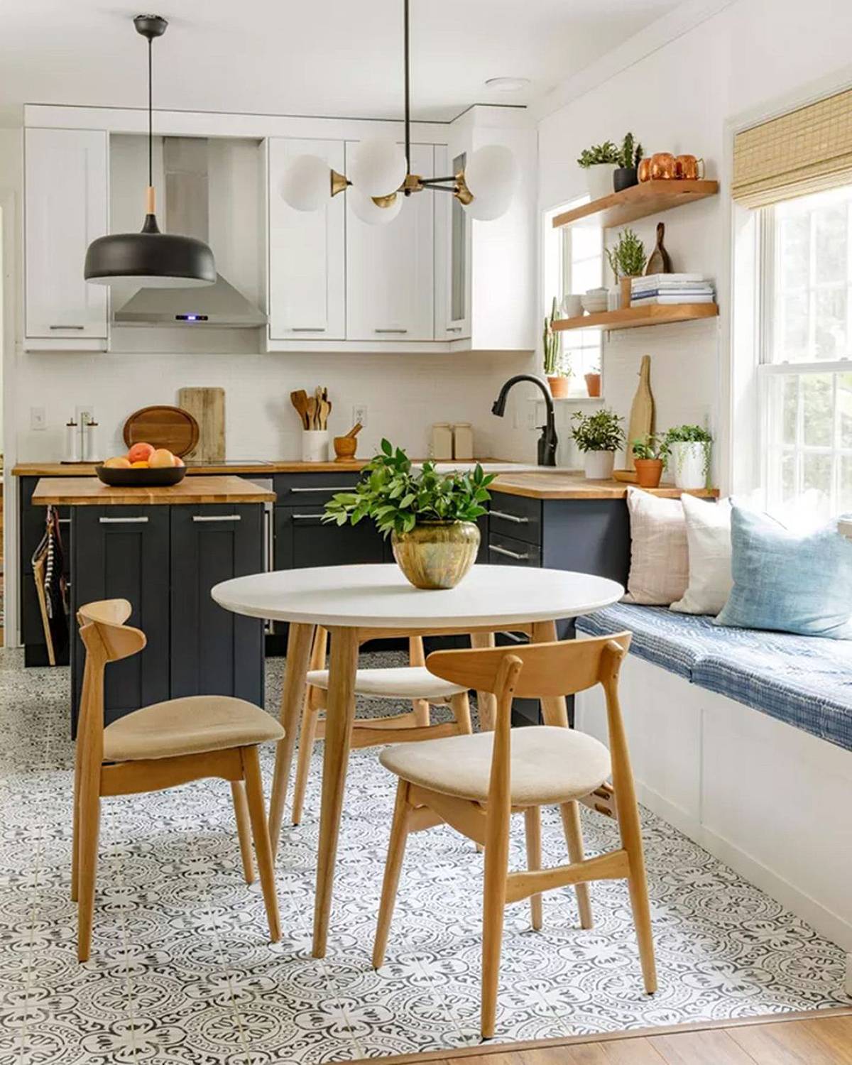 tiny kitchen with blue seating