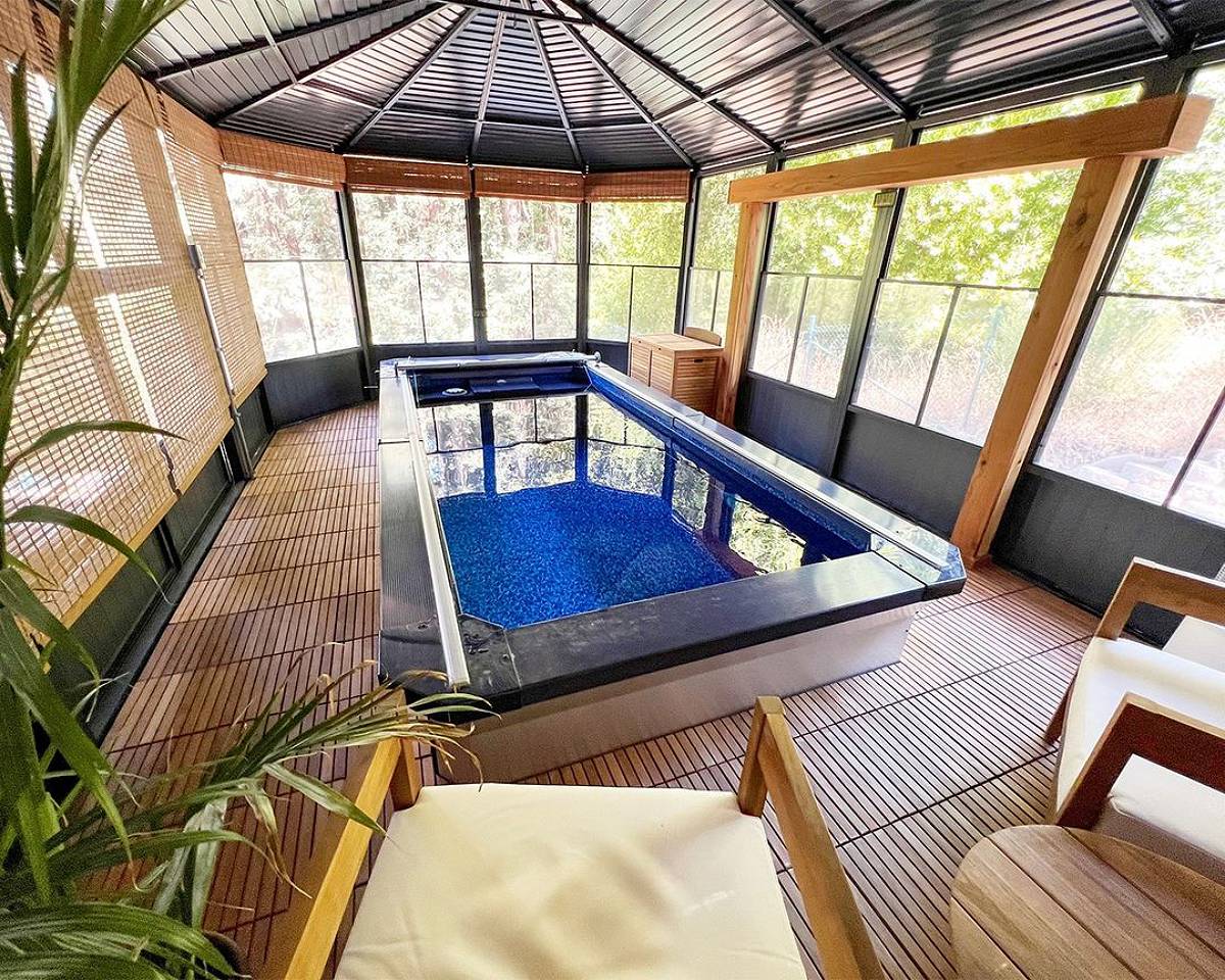 above-ground pool on wooden floor