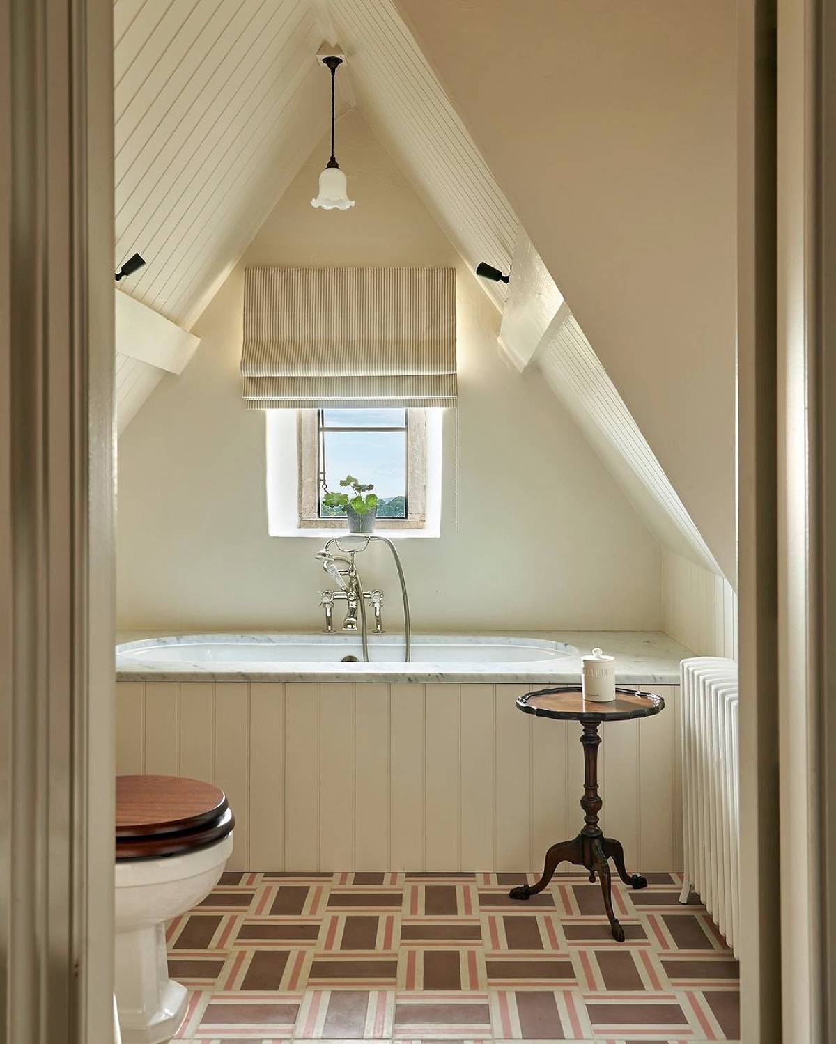attic bathroom with cement tiles