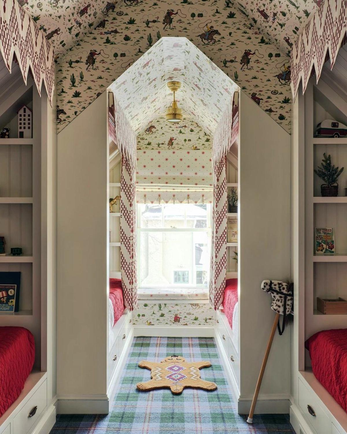 attic bedroom with window seat and wallpaper