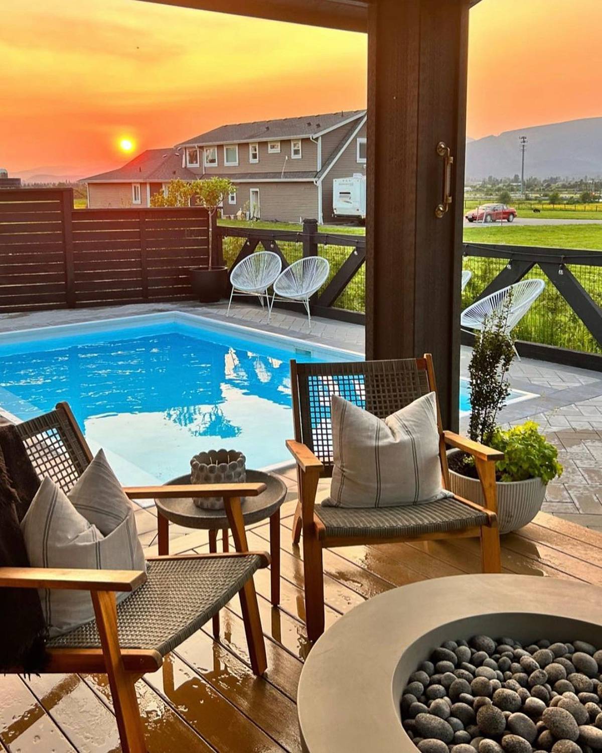backyard pool with beautiful sunset view
