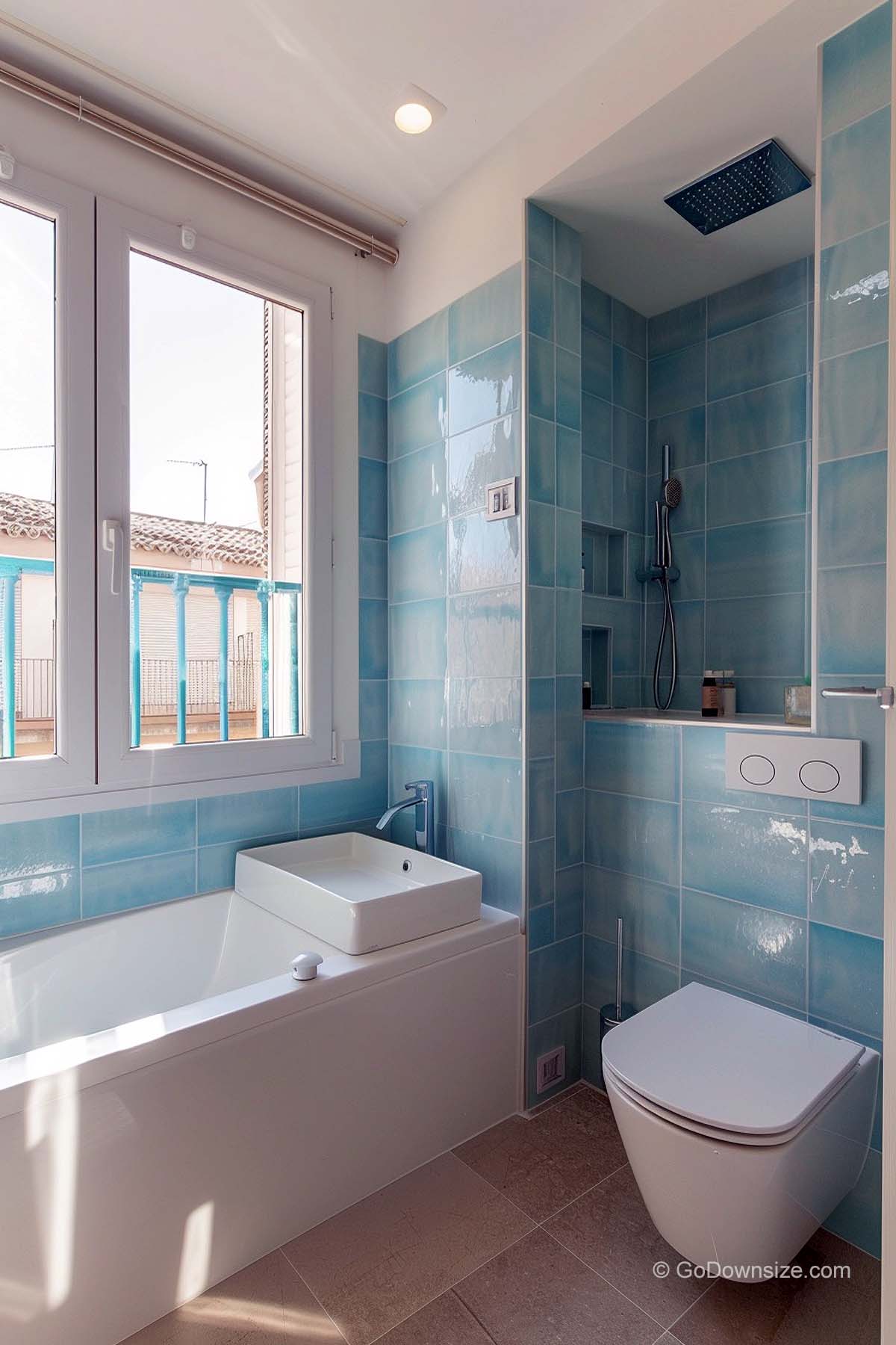 bathroom with dusty rose floor and blue walls