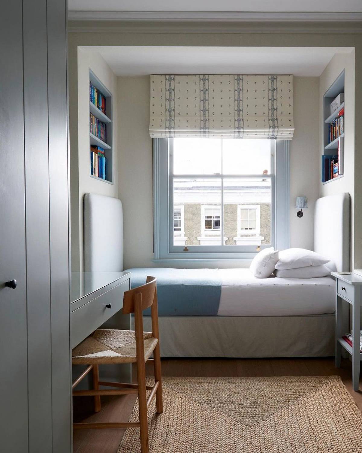 bed nook with recessed wall shelves