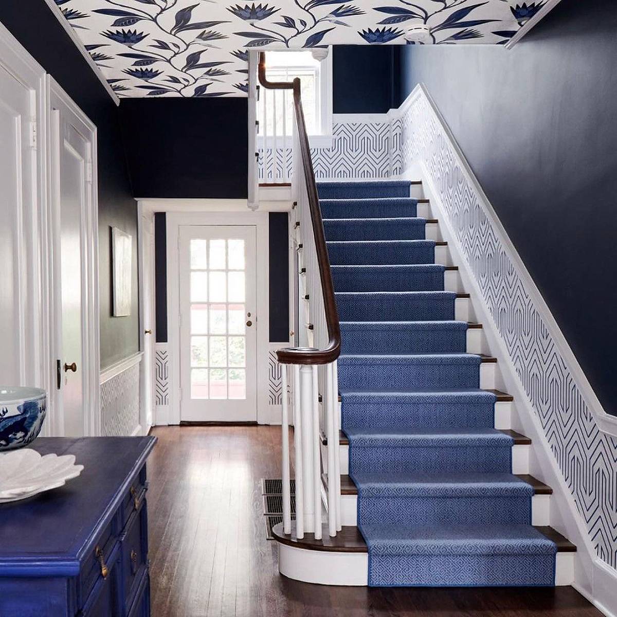 blue stairs with blue wallpaper