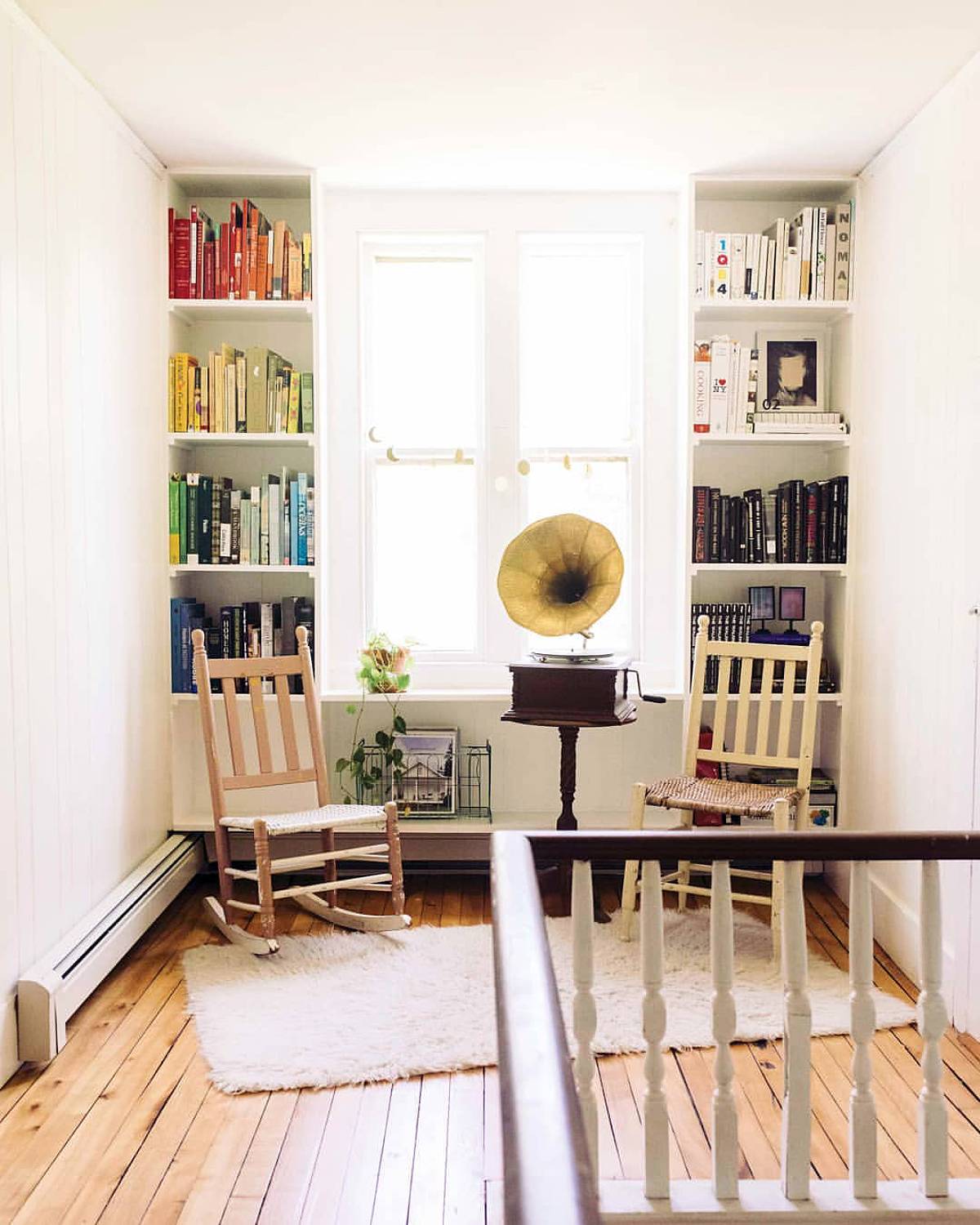 bookshelves beside the window