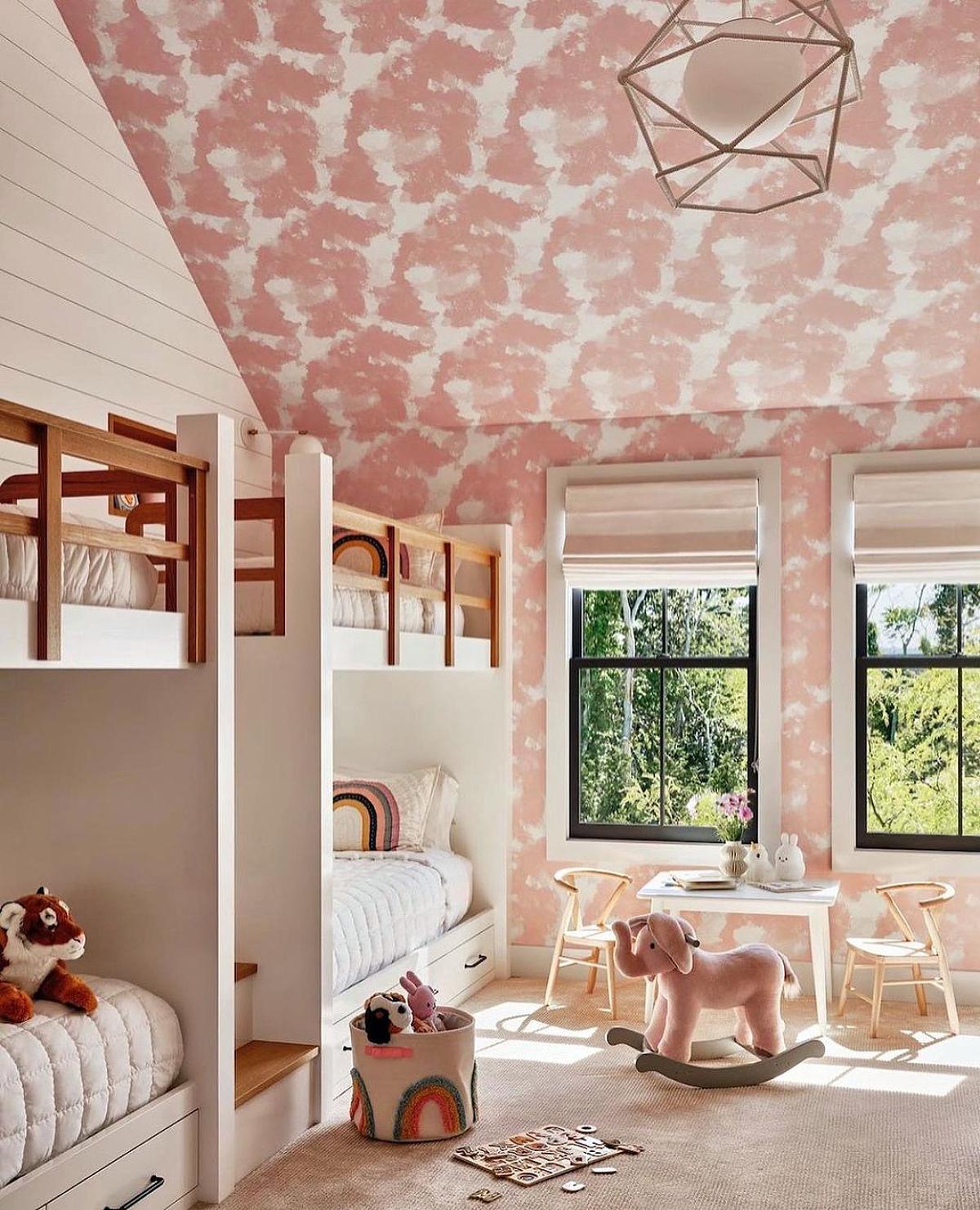 bunk bed on attic with dusty rose wallpaper