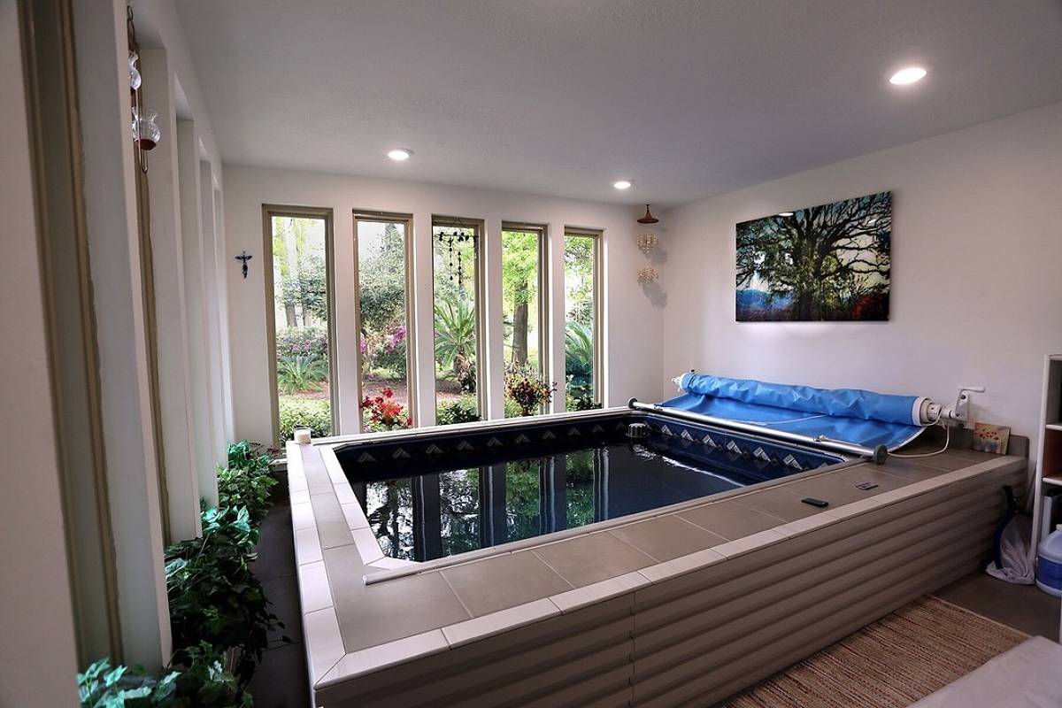 indoor pool with vertical windows