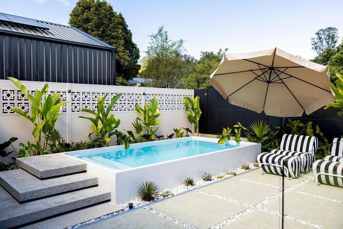 minimalist white tiled pool