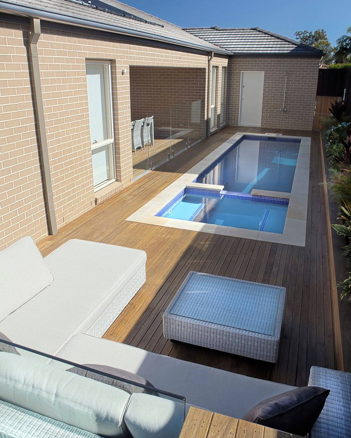 pool with wooden deck