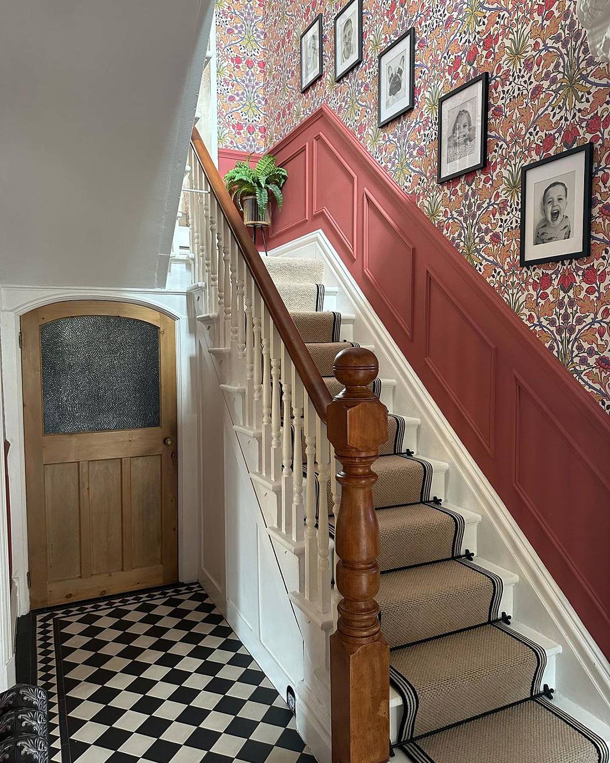 red wall paneling and wallpaper
