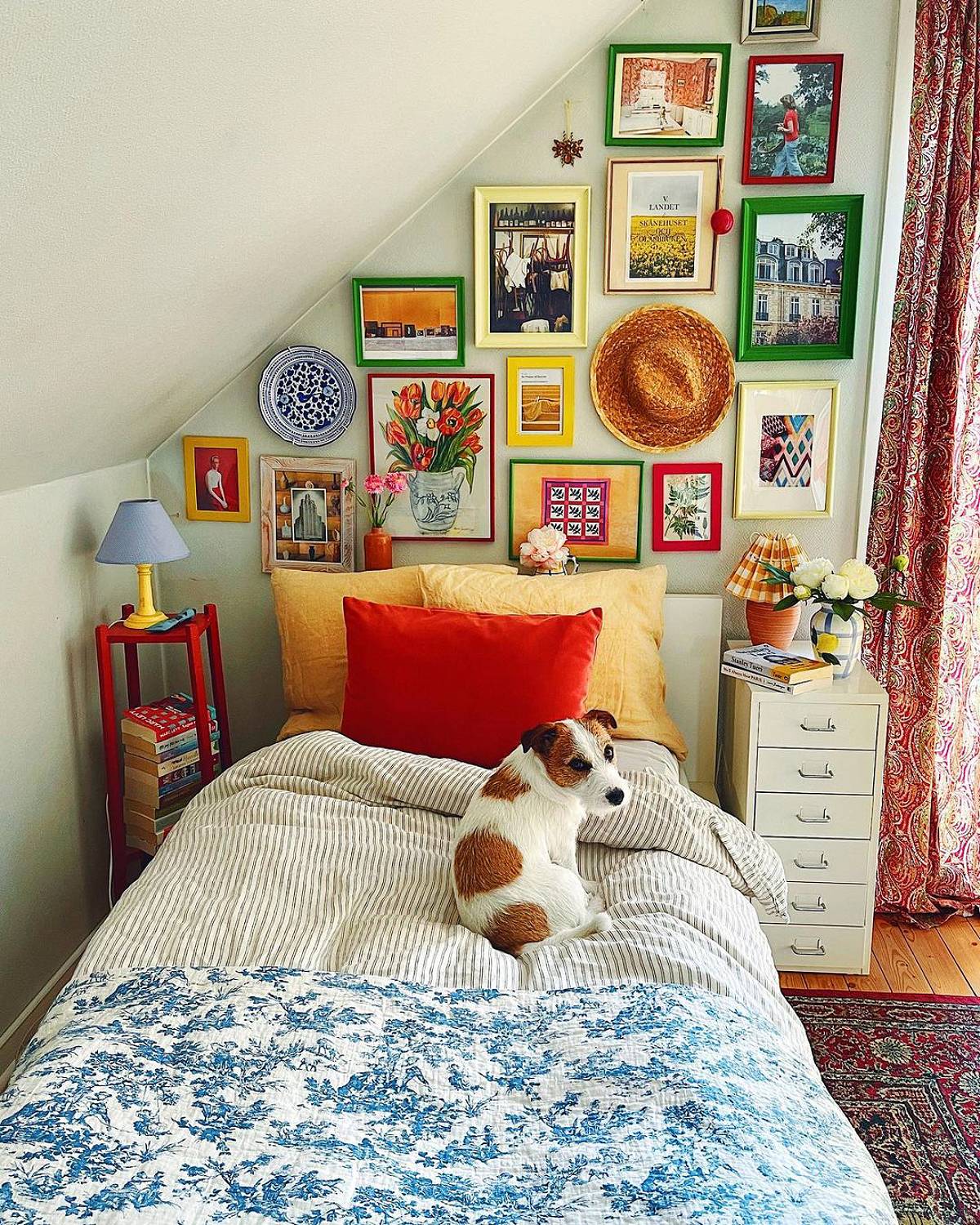 sloped bedroom with gallery wall