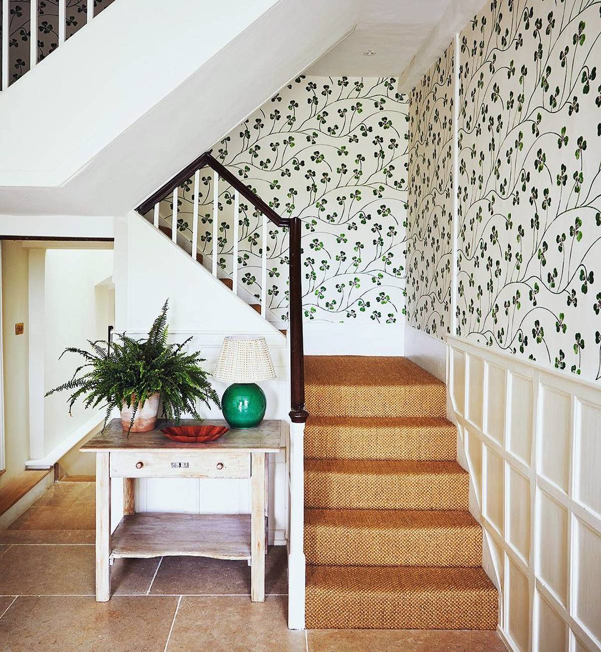 stairs with clover leaf wallpaper