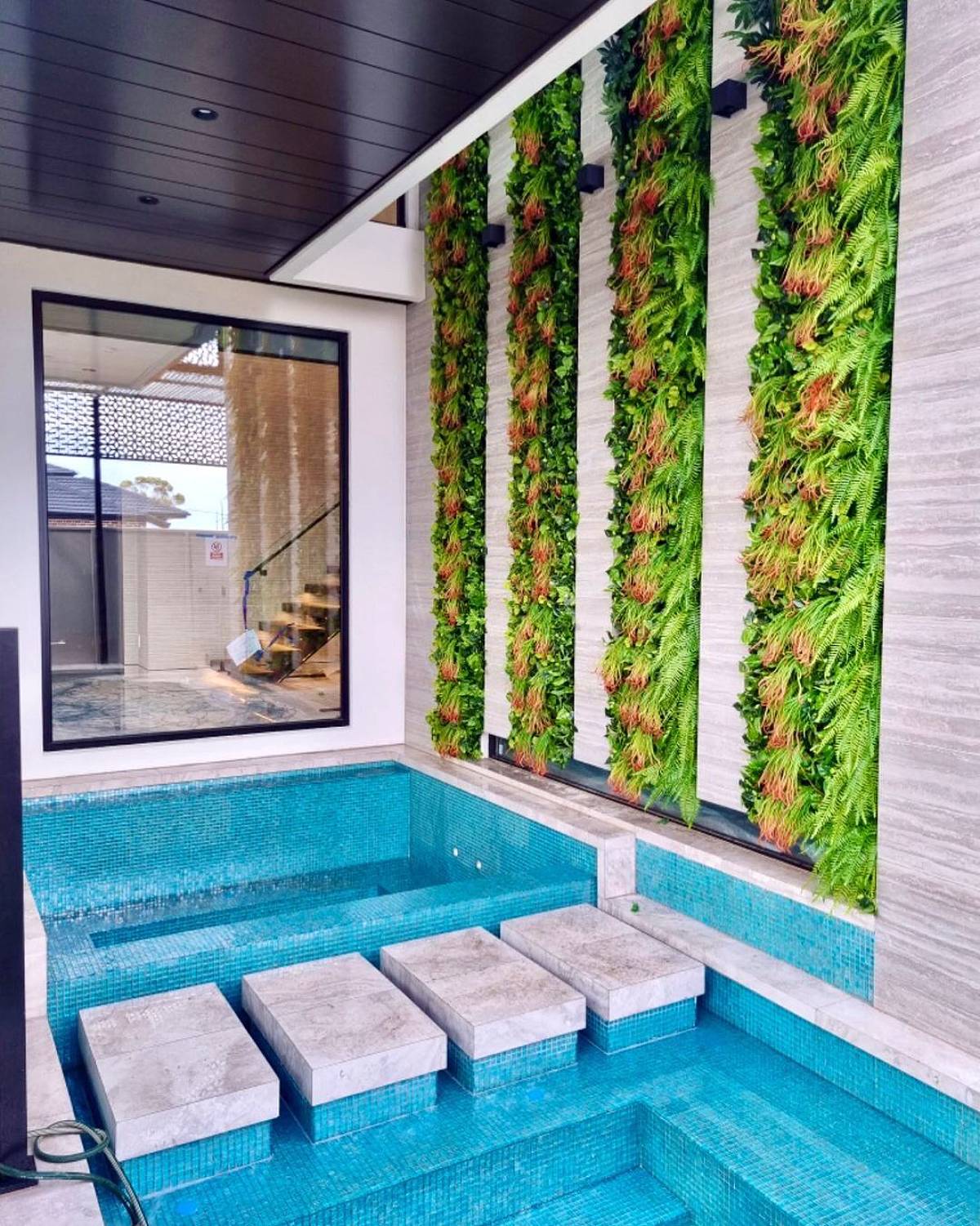 vertical garden above swimming pool