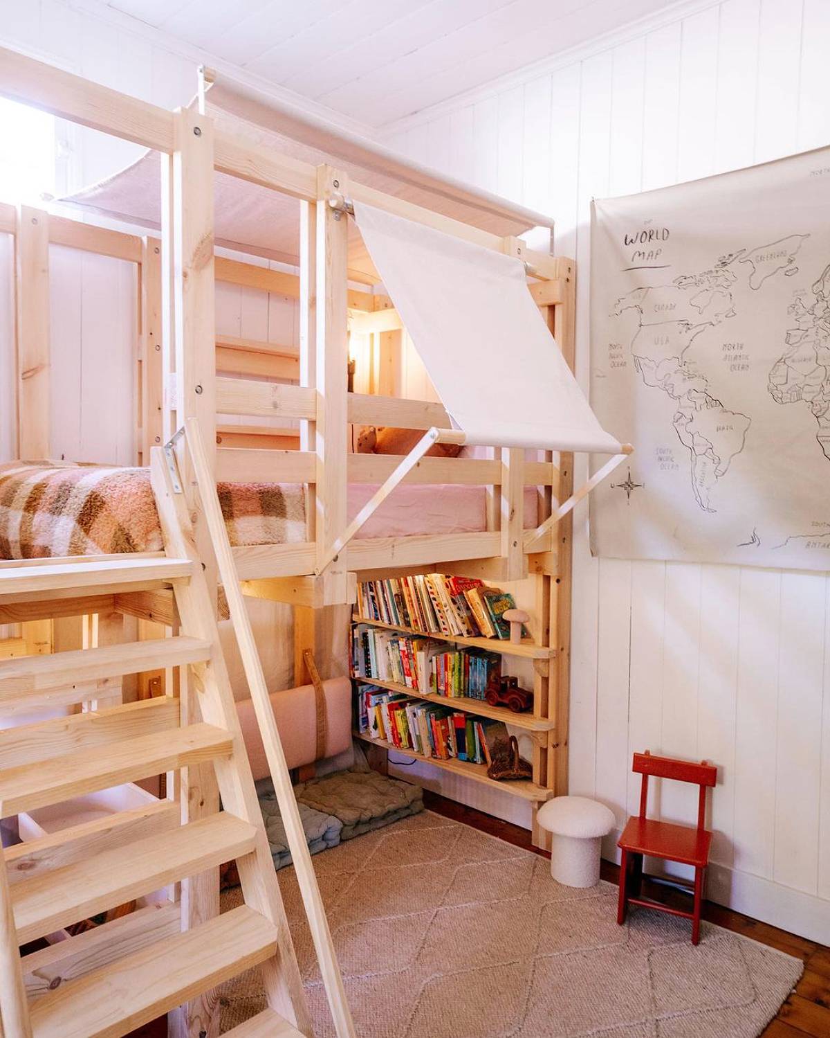 wooden loft with built-in bookshelves