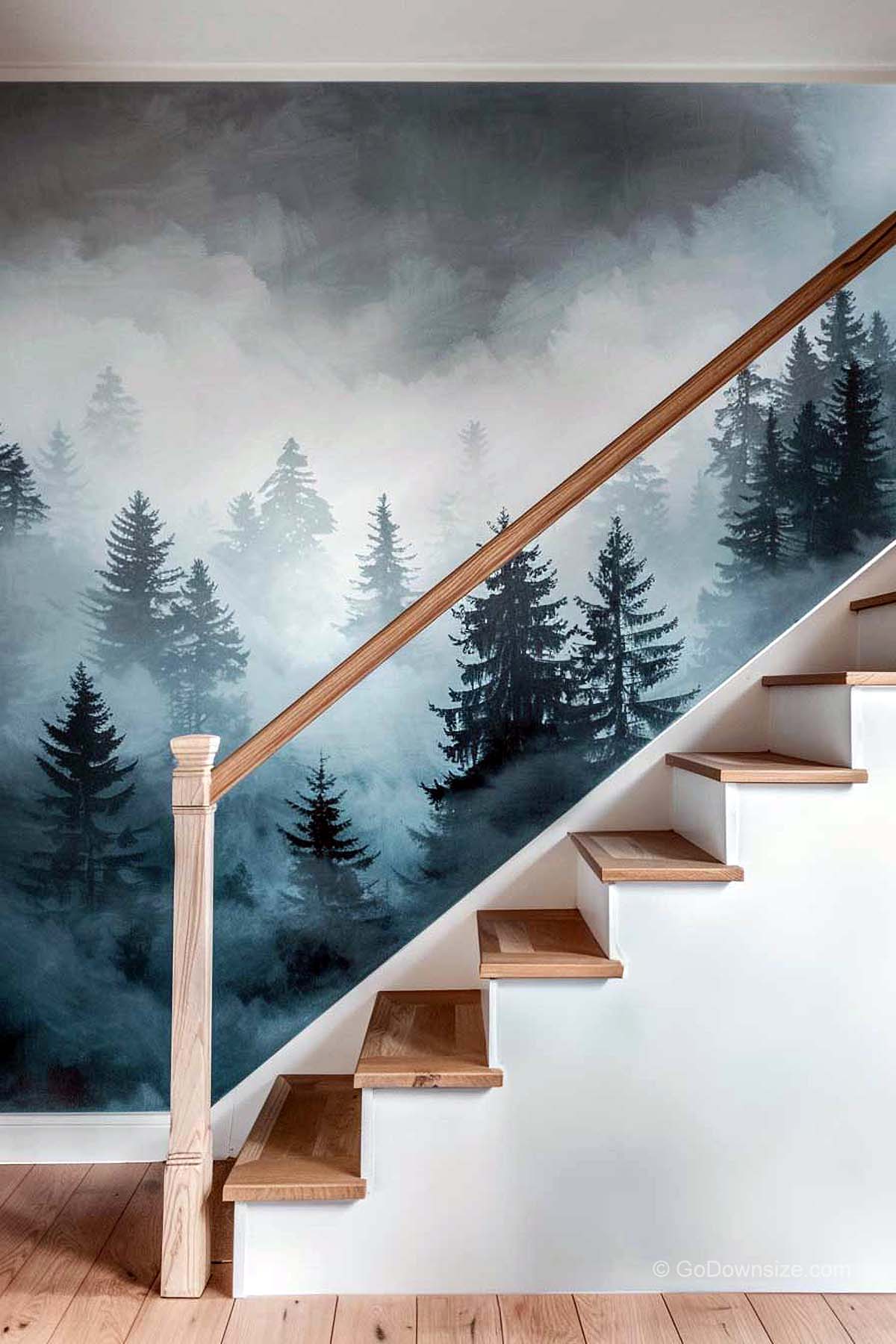 wooden staircase with forest wallpaper