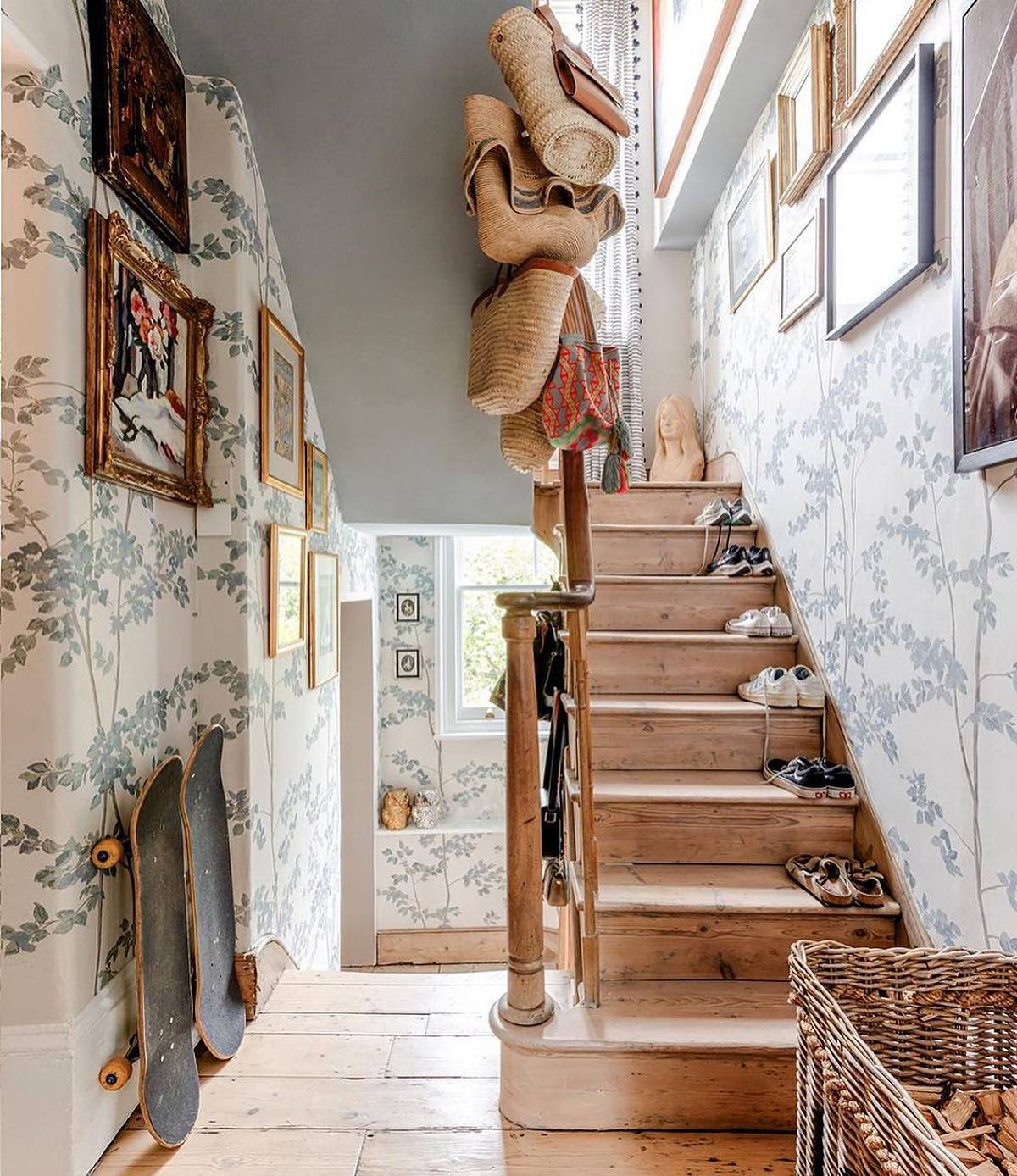 wooden stairs with leaves wallpaper