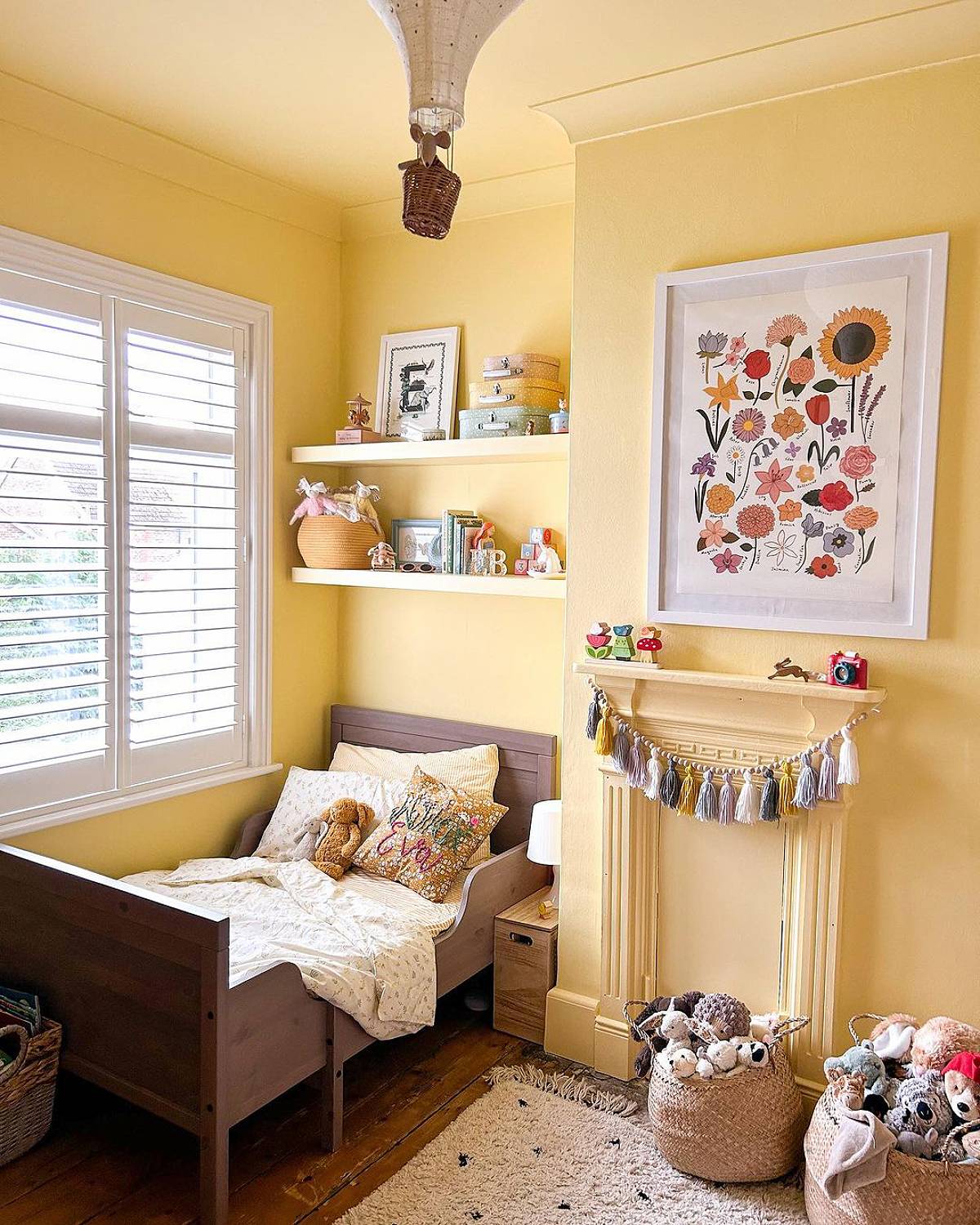 yellow bedroom with floating shelves