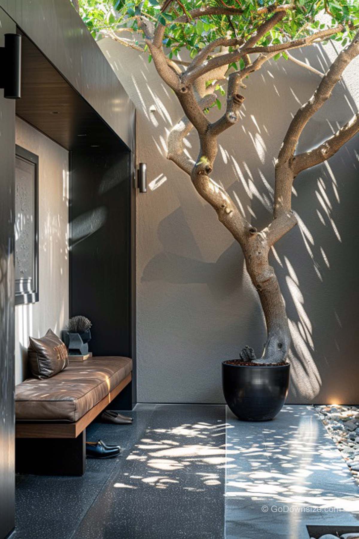 hallway with gray floor tiles and tree