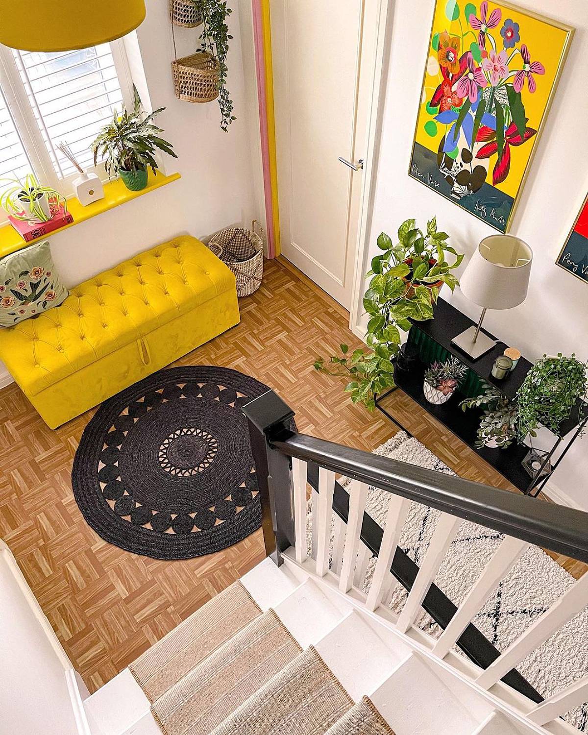 tiny hallway with brown floor