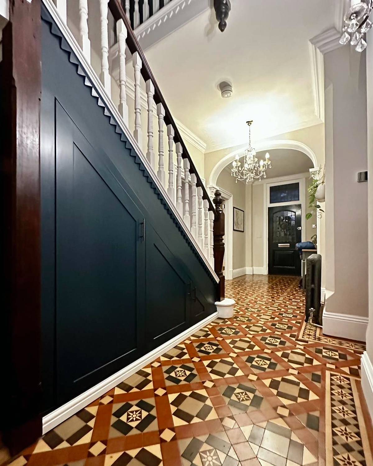 under stair storage and cement floor tiles