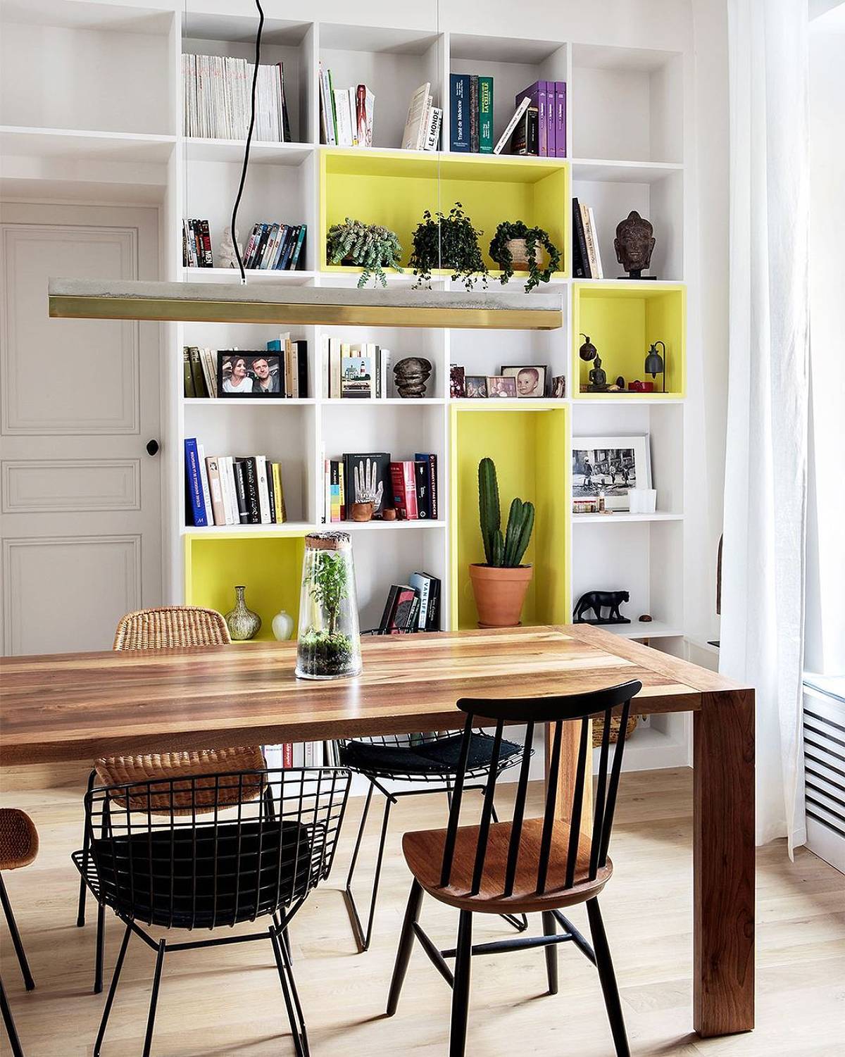 white and yellow bookshelves