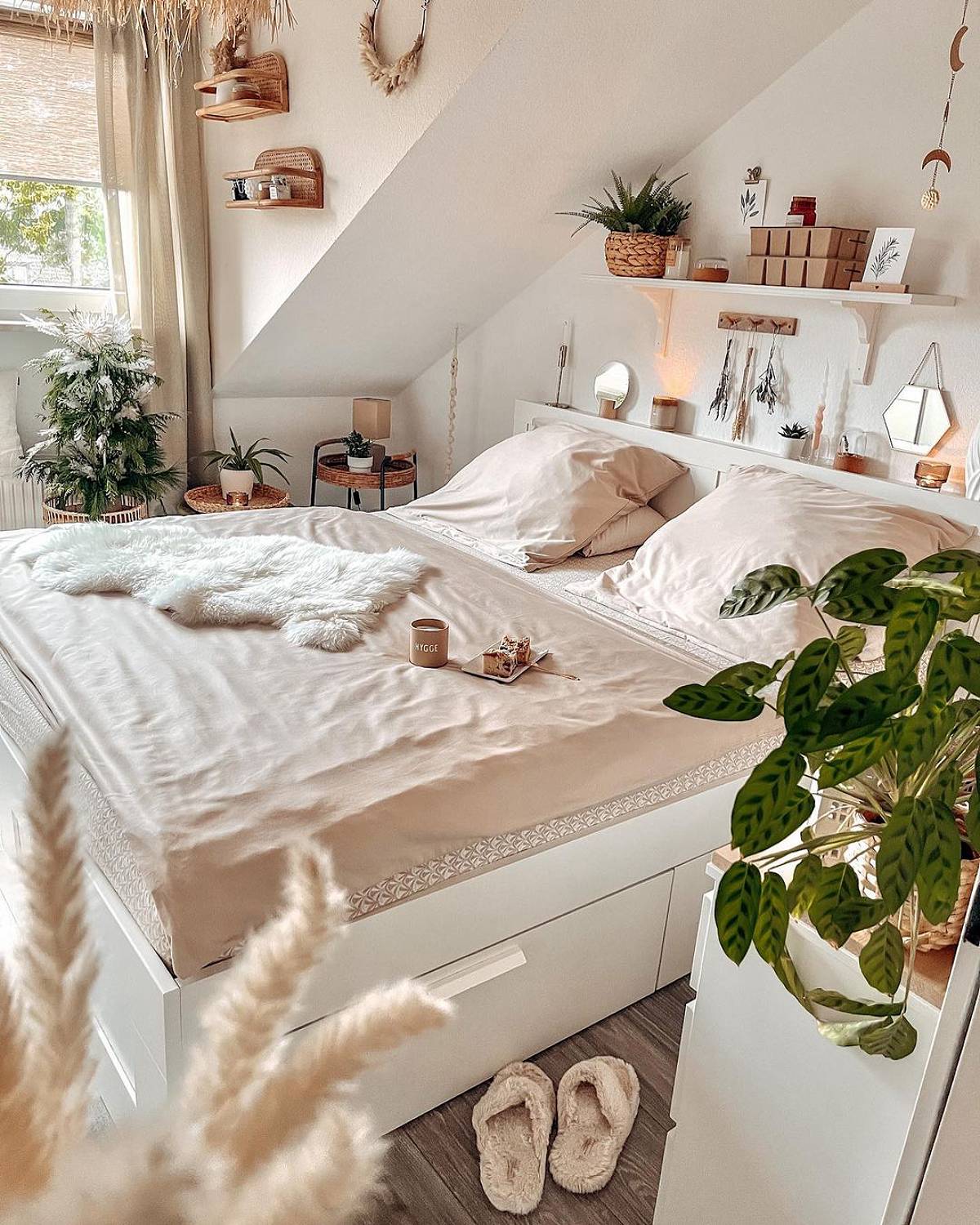 compact white bedroom with plants
