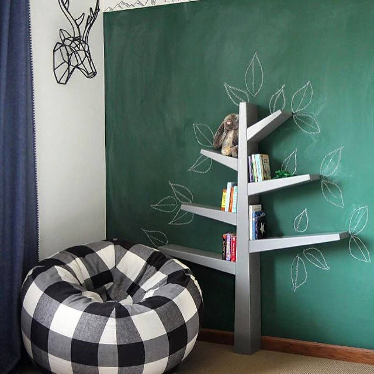 minimalist tree bookshelves on chalkboard