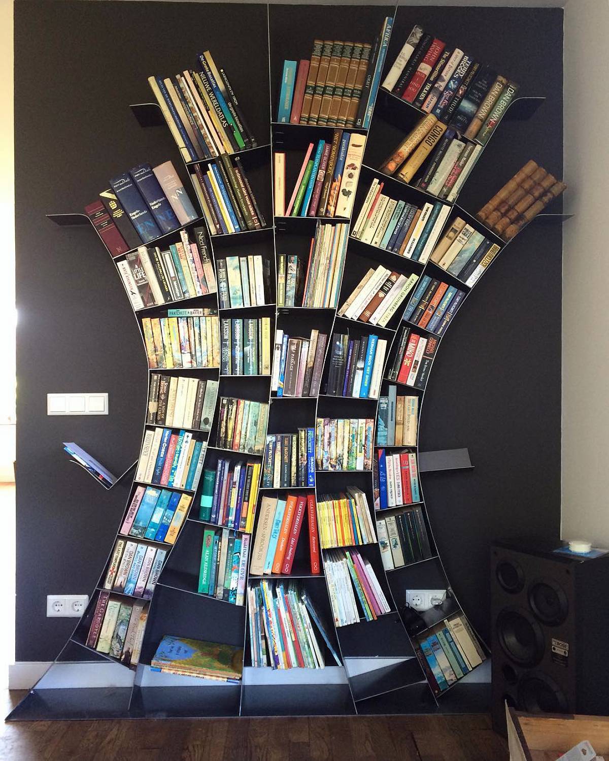 tree-inspired bookshelves using metal plates