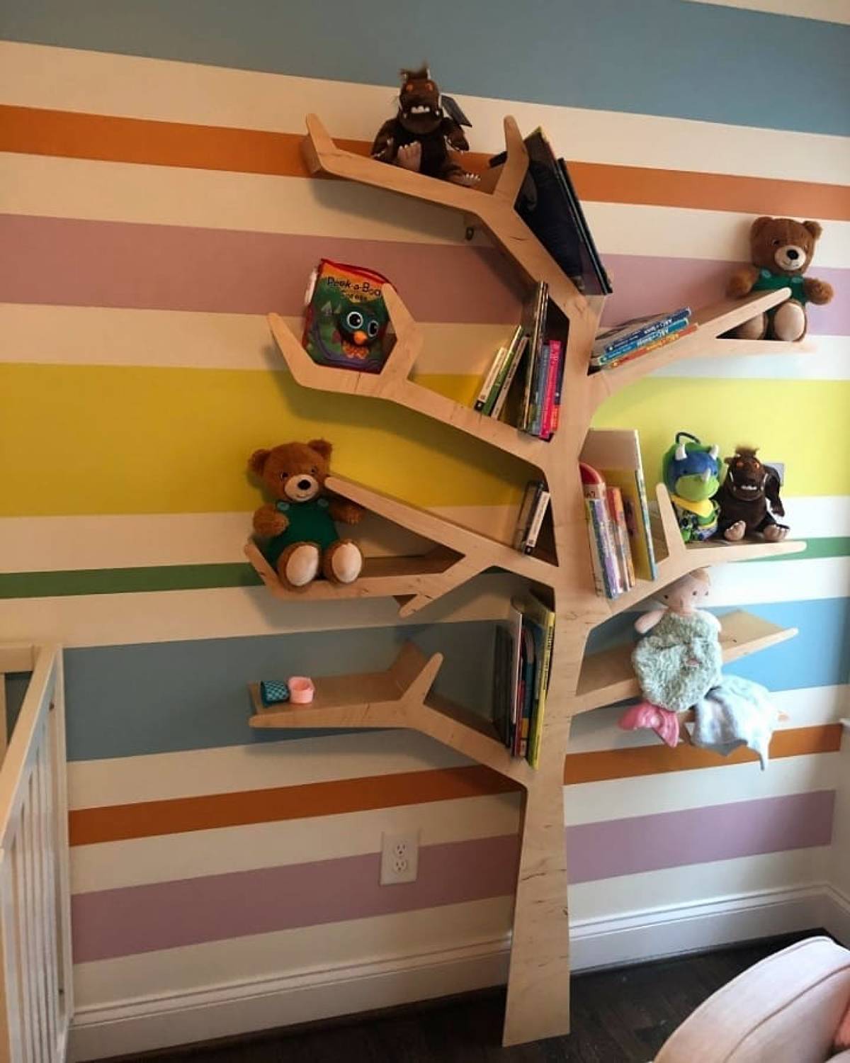 tree shelves on colorful wall